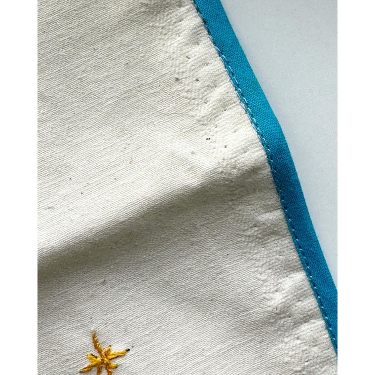 Raw white runner, light blue border and embroidered angels