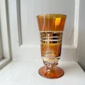 Glass goblet, orange soap bubble effect