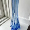 Light blue glass vase with feet, NB