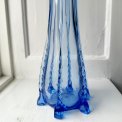 Light blue glass vase with feet, NB