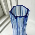 Light blue glass vase with feet, NB