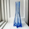 Light blue glass vase with feet, NB