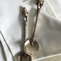 Brass spoon with man, per piece