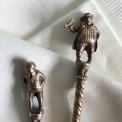 Brass spoon with man, per piece