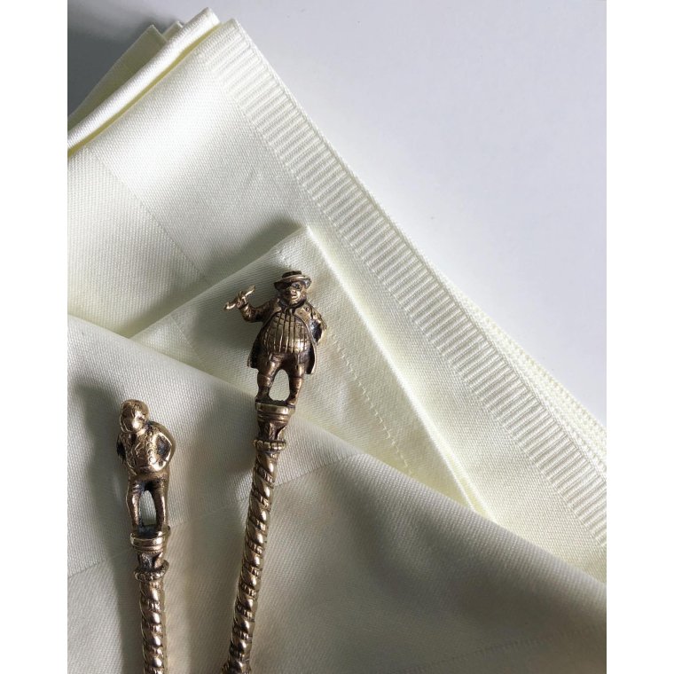 Brass spoon with man, per piece