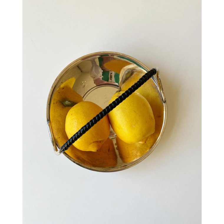 Silverplate with black plastic wrap