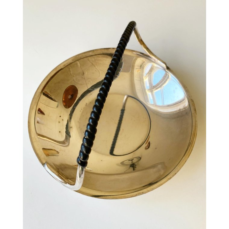 Silverplate with black plastic wrap