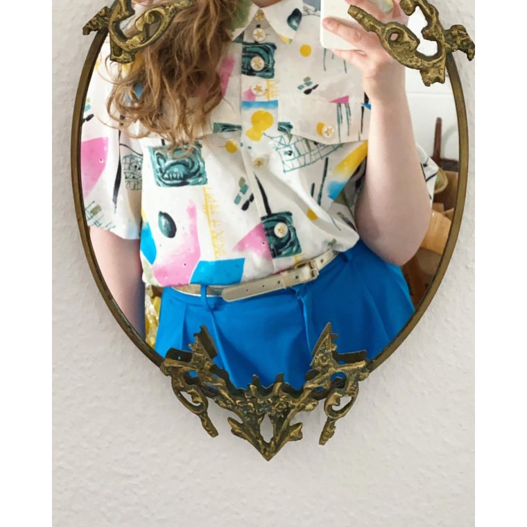 Messingspejl, relief i toppen