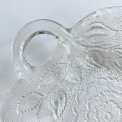 Clear glass, leaf-shaped with cherry impression