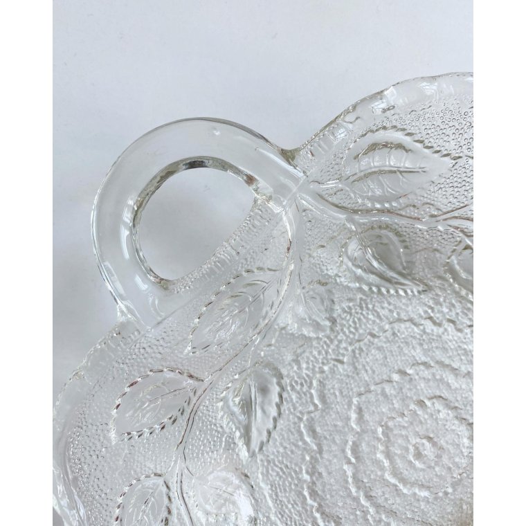 Clear glass, leaf-shaped with cherry impression