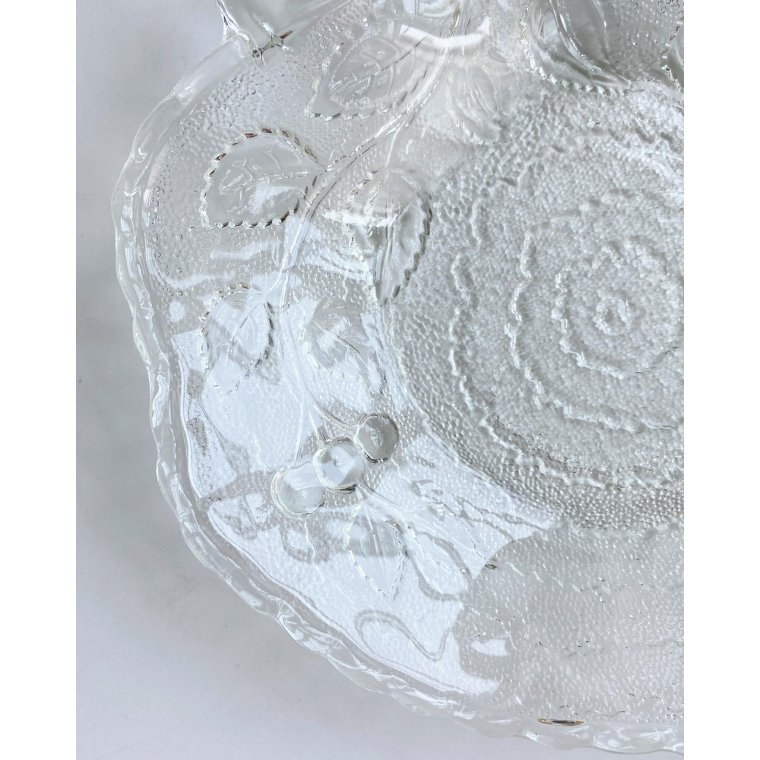 Clear glass, leaf-shaped with cherry impression