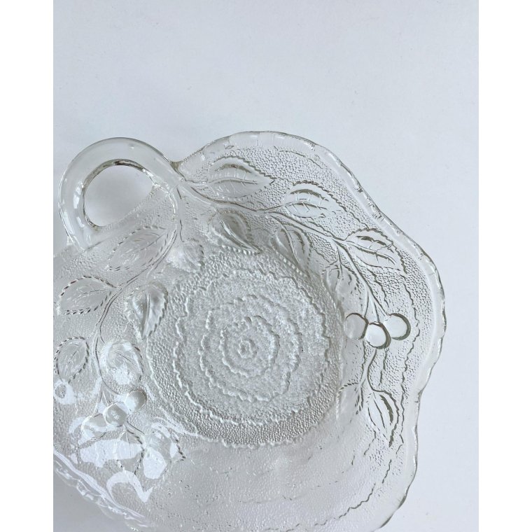 Clear glass, leaf-shaped with cherry impression