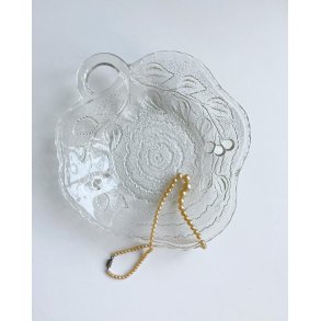 Clear glass, leaf-shaped with cherry impression