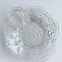 Clear glass, leaf-shaped with cherry impression