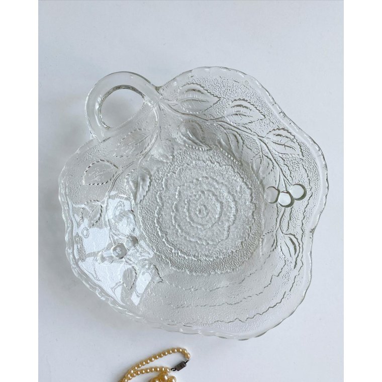 Clear glass, leaf-shaped with cherry impression