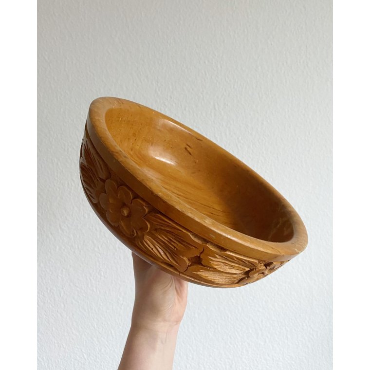Wooden bowl with flower carving