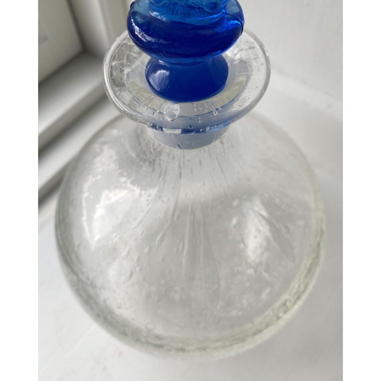 Clear carafe with bubbles and cactus cork