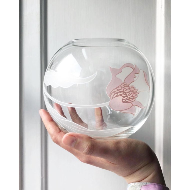 Glass ball with pink flower