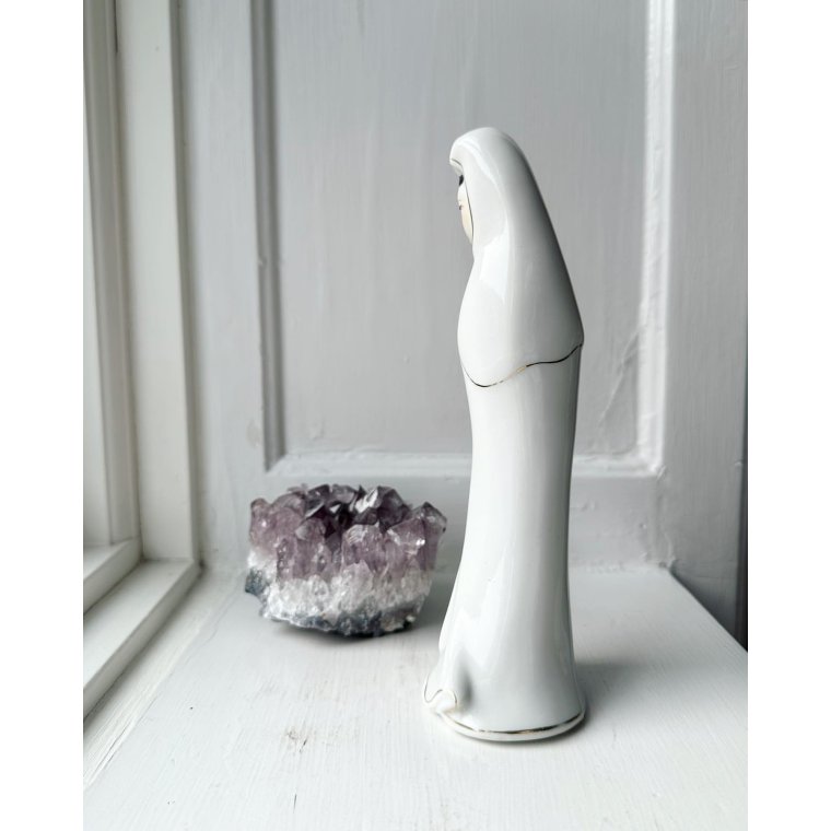 Woman in white dress, porcelain figurine