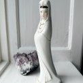 Woman in white dress, porcelain figurine