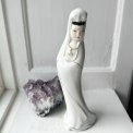 Woman in white dress, porcelain figurine