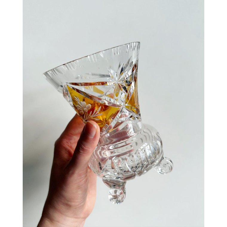 Crystal trophy, amber-colored, 3 snail shell feet, NB