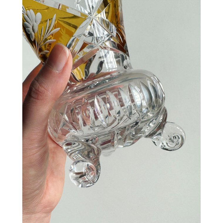 Crystal trophy, amber-colored, 3 snail shell feet, NB