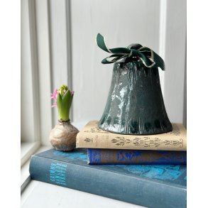Ceramic bell in green colors