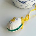 Easter egg with embroidered chicken and ribbon