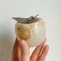 Apple figure, white onyx with metal leaf