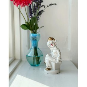 Porcelain figure, clown on dice, painted detail