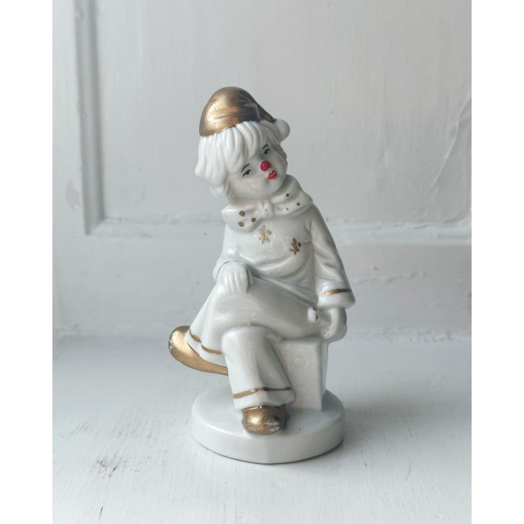 Porcelain figure, clown on dice, painted detail