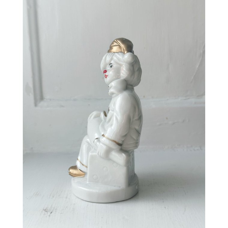 Porcelain figure, clown on dice, painted detail