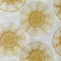 Amber glass plates w fruit motif, NB, set of 8