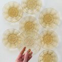 Amber glass plates w fruit motif, NB, set of 8
