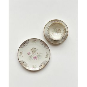 Trio set, big cup with saucer and plate, flowers and gold