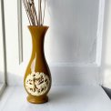 Vase, curry yellow plastic w motif
