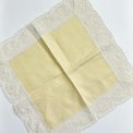 Pastel yellow fabric napkin w crocheted edge