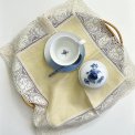 Pastel yellow fabric napkin w crocheted edge