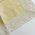 Pastel yellow fabric napkin w crocheted edge