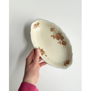Small dish, off white w orange flowers and brue trim