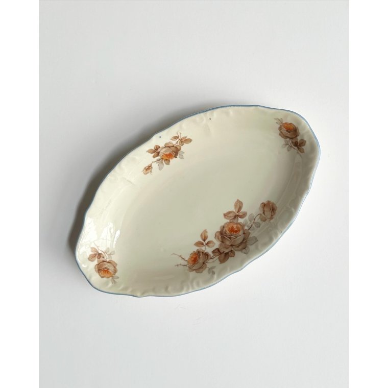 Small dish, off white w orange flowers and brue trim
