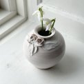 Small white sphere vase w ceramic flowers
