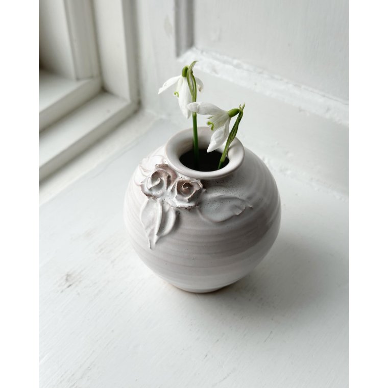 Small white sphere vase w ceramic flowers