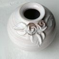 Small white sphere vase w ceramic flowers