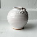 Small white sphere vase w ceramic flowers