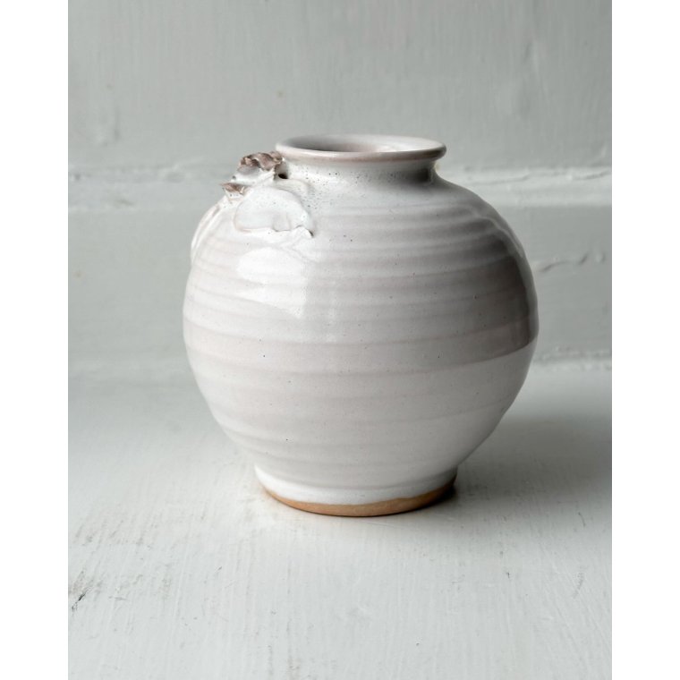 Small white sphere vase w ceramic flowers