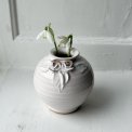 Small white sphere vase w ceramic flowers