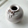 Small white sphere vase w ceramic flowers