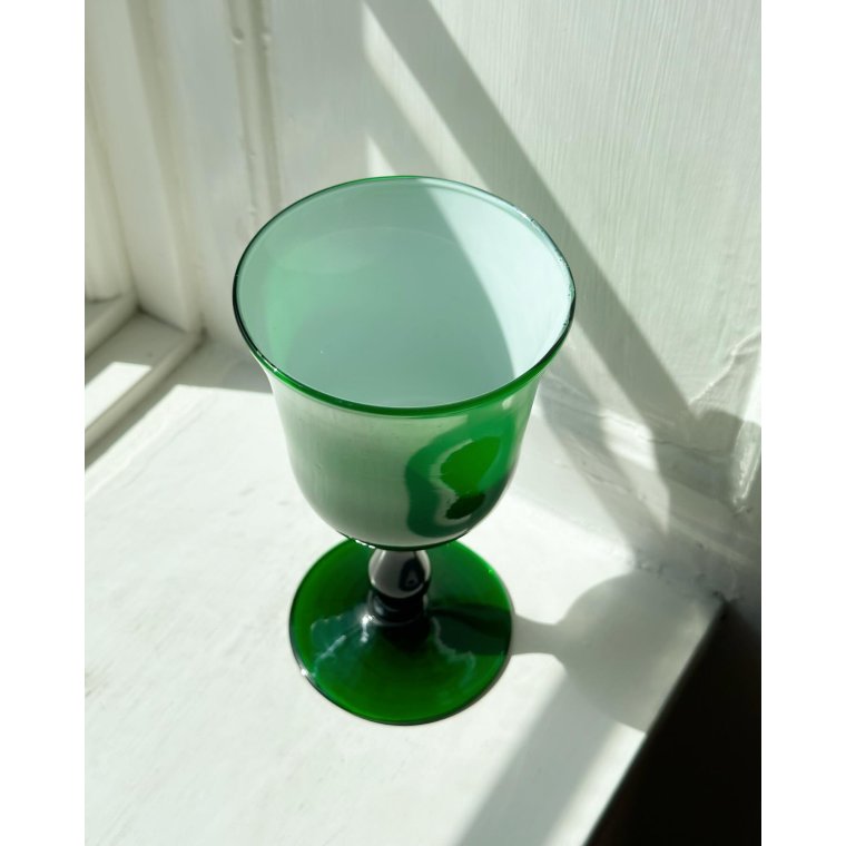 Cup on foot, white and green glass